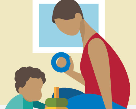 parent playing with young child